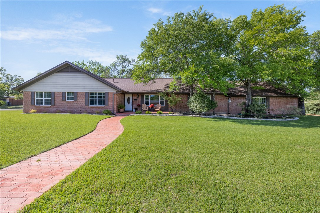 800 Esther Boulevard Bryan, TX 77802 - Photo 1 of 37 a view of a house with a big yard