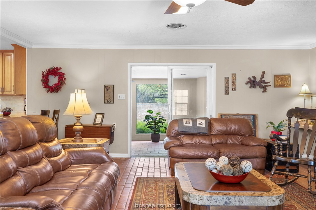800 Esther Boulevard Bryan, TX 77802 - Photo 13 of 37 a living room with furniture and a window