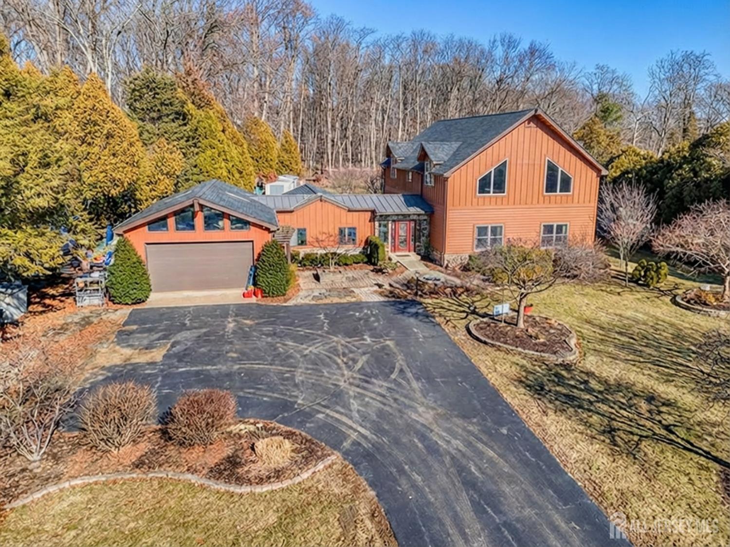 25 Davidson's Mill Road North Brunswick, NJ 08902 - Photo 2 of 56 a front view of a house with a yard