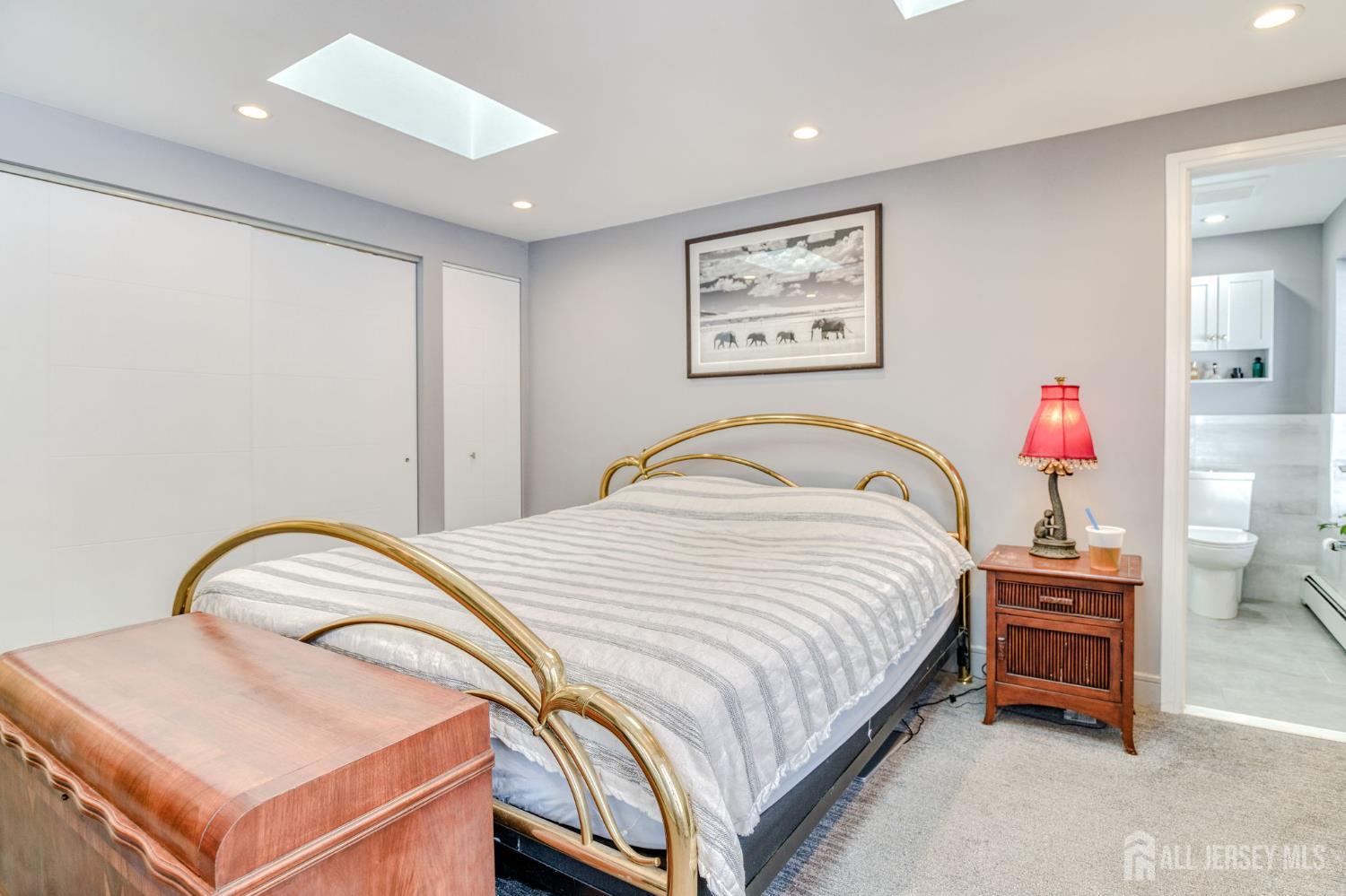 25 Davidson's Mill Road North Brunswick, NJ 08902 - Photo 24 of 56 a bedroom with a bed and a dresser