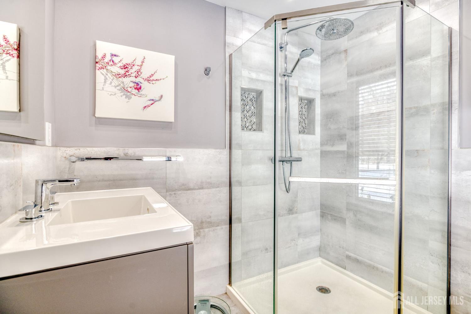 25 Davidson's Mill Road North Brunswick, NJ 08902 - Photo 26 of 56 a bathroom with a sink and a shower