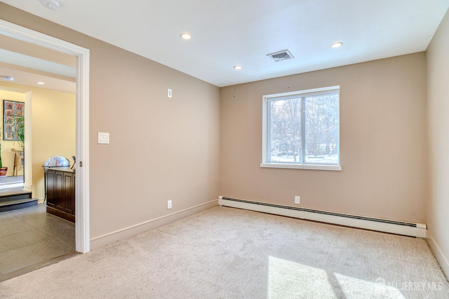 25 Davidson's Mill Road North Brunswick, NJ 08902 - Photo 27 of 56 an empty room with windows and closet