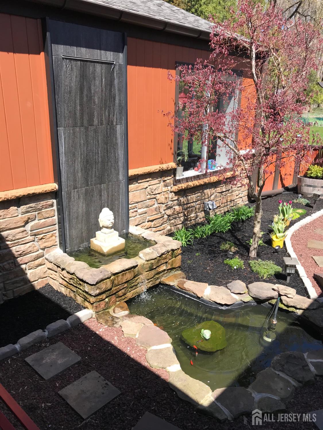 25 Davidson's Mill Road North Brunswick, NJ 08902 - Photo 55 of 56 a view of a wooden floor and a yard in front of the house