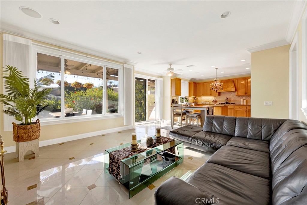 11233 Ravenna Lane Porter Ranch, CA 91326 - Photo 11 of 46 a living room with furniture and a large window