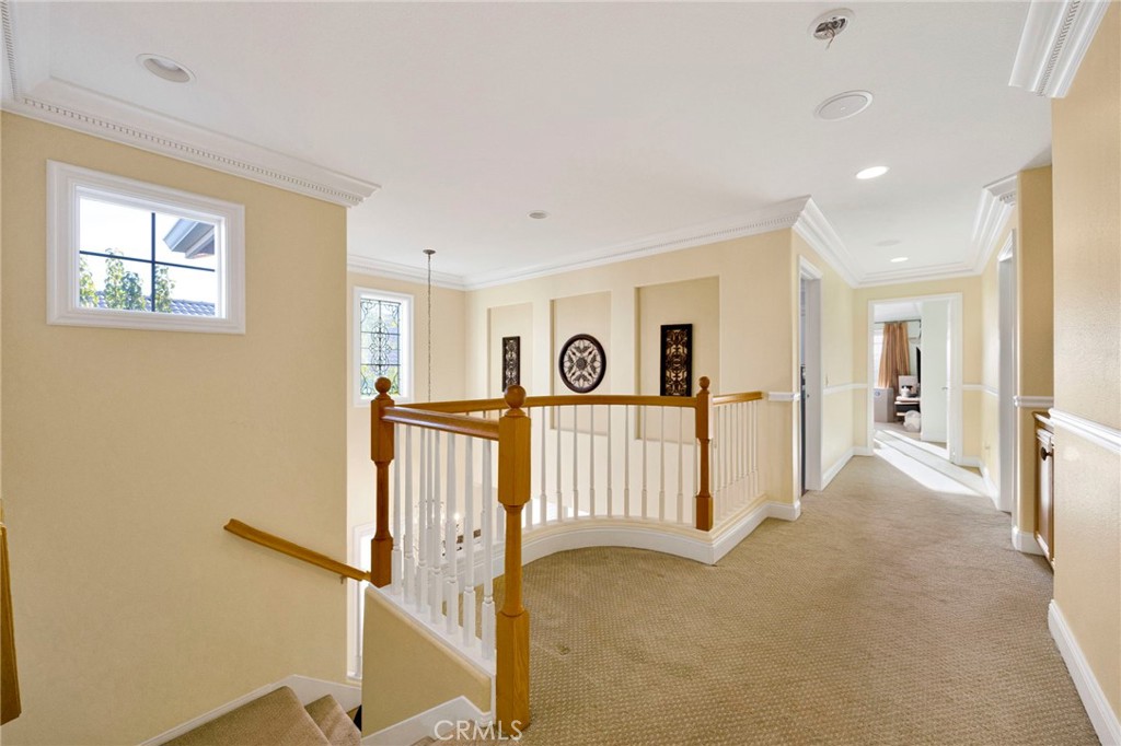 11233 Ravenna Lane Porter Ranch, CA 91326 - Photo 19 of 46 a view of a hallway with windows