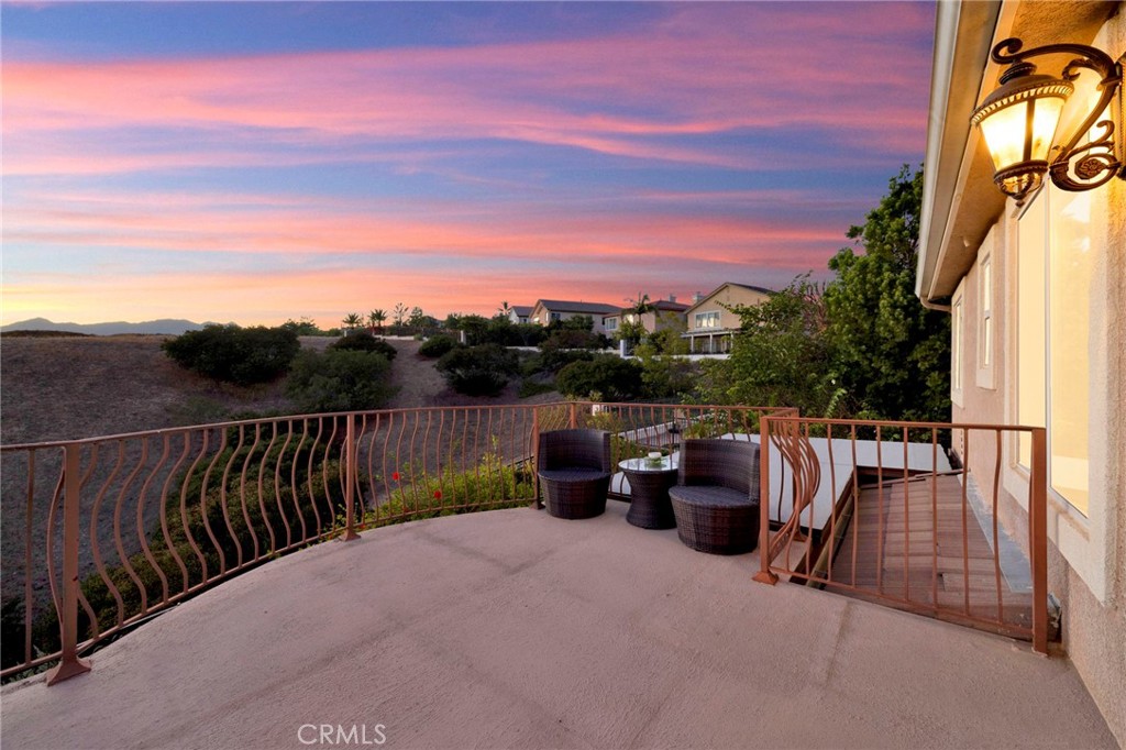 11233 Ravenna Lane Porter Ranch, CA 91326 - Photo 25 of 46 a view of balcony with couches and sky view