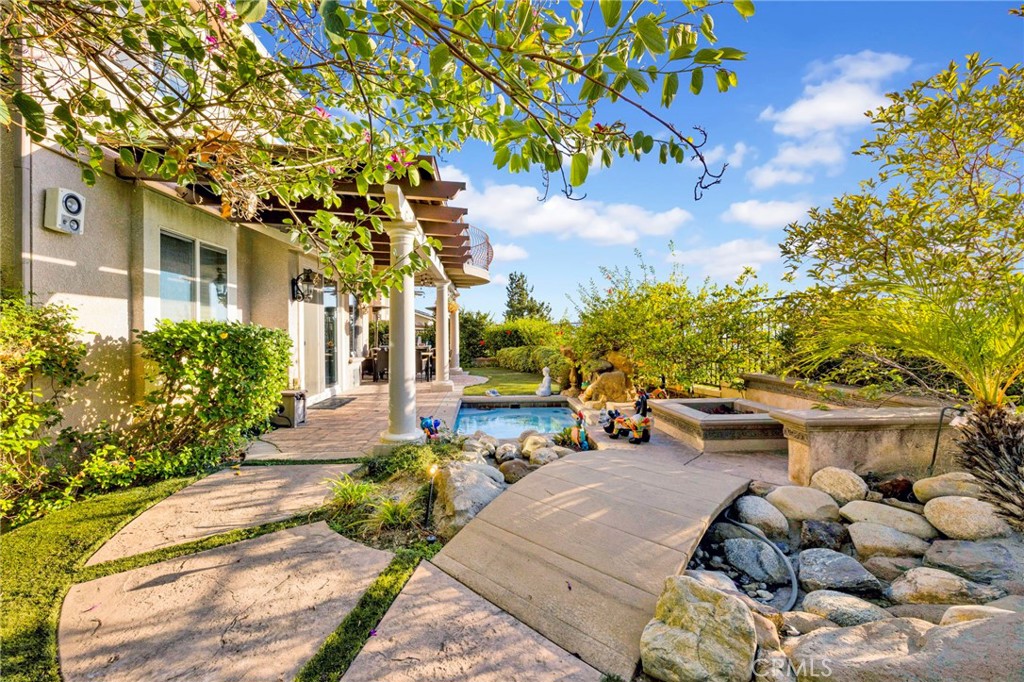 11233 Ravenna Lane Porter Ranch, CA 91326 - Photo 31 of 46 a front view of a house with a yard