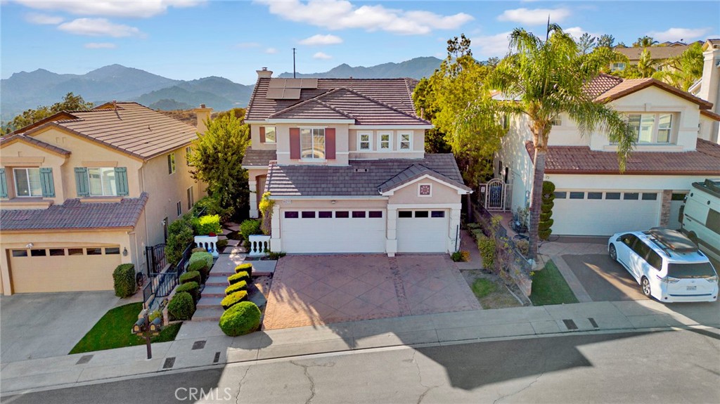 11233 Ravenna Lane Porter Ranch, CA 91326 - Photo 36 of 46 front view of house with a street