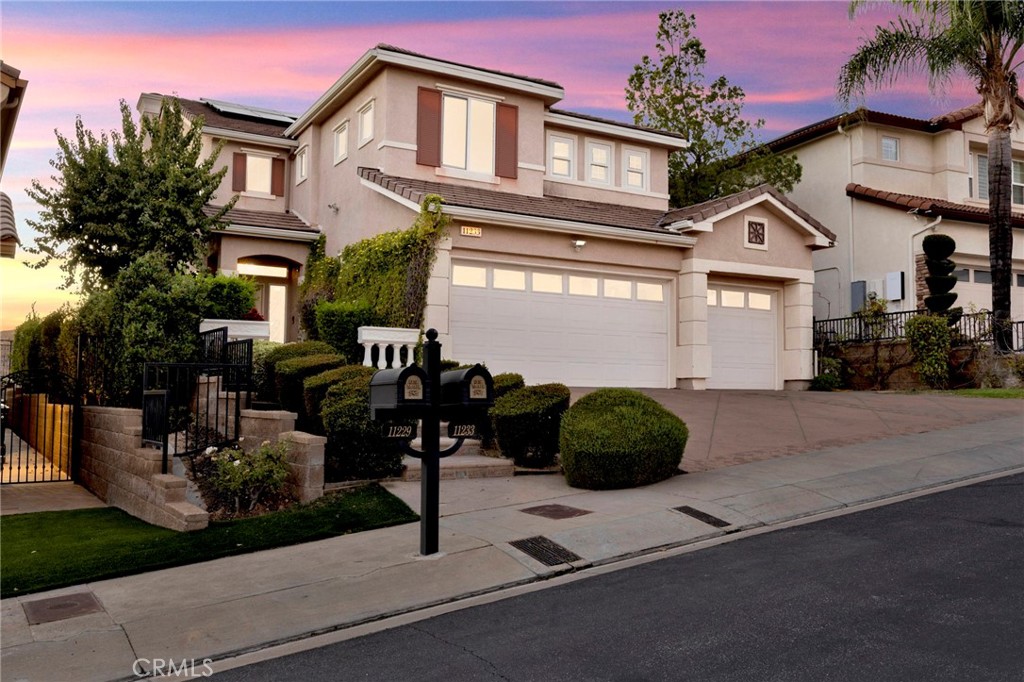 11233 Ravenna Lane Porter Ranch, CA 91326 - Photo 39 of 46 a front view of a house