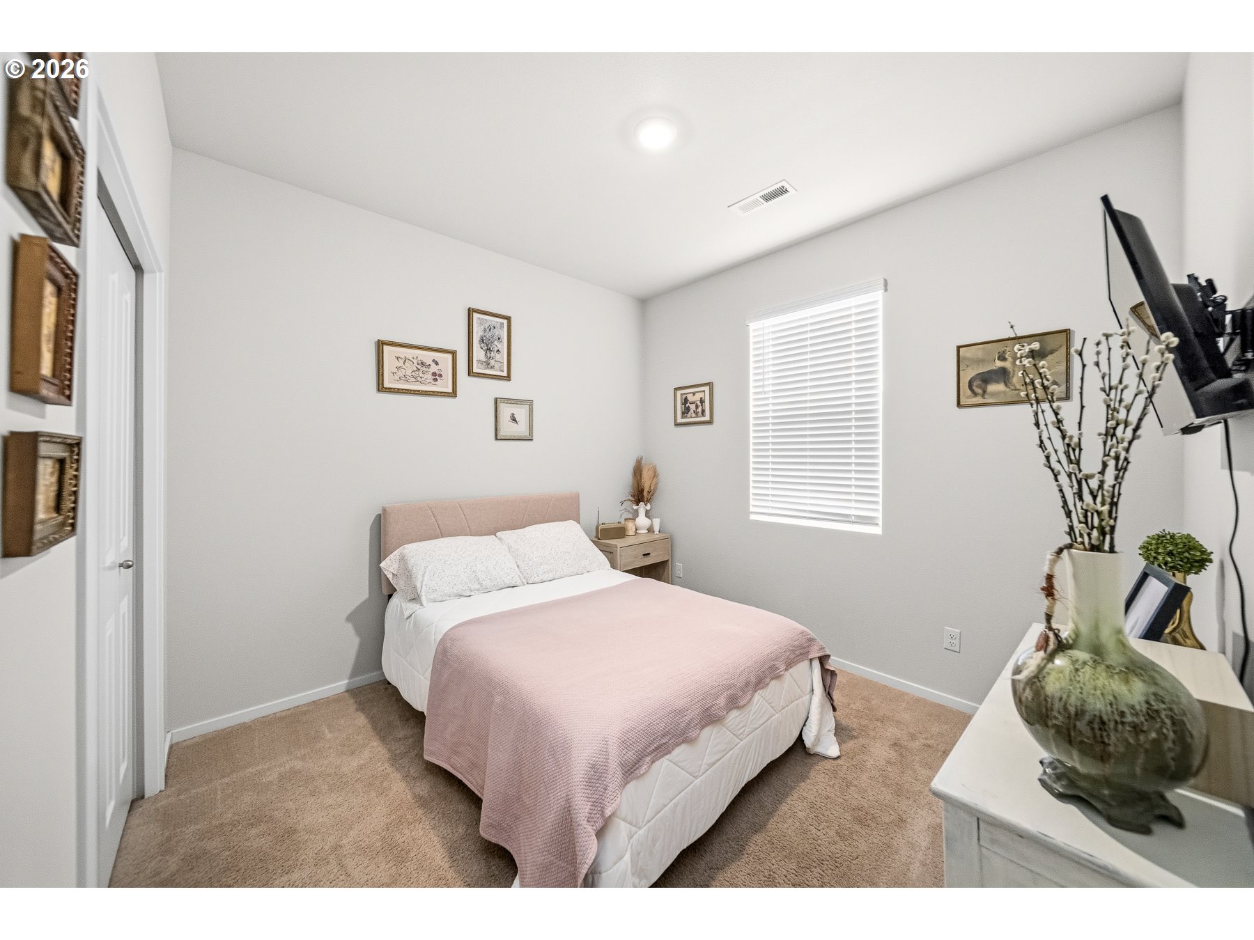 597 Northeast Union Loop Prineville, OR 97754 - Photo 18 of 22 a bedroom with a bed and a window