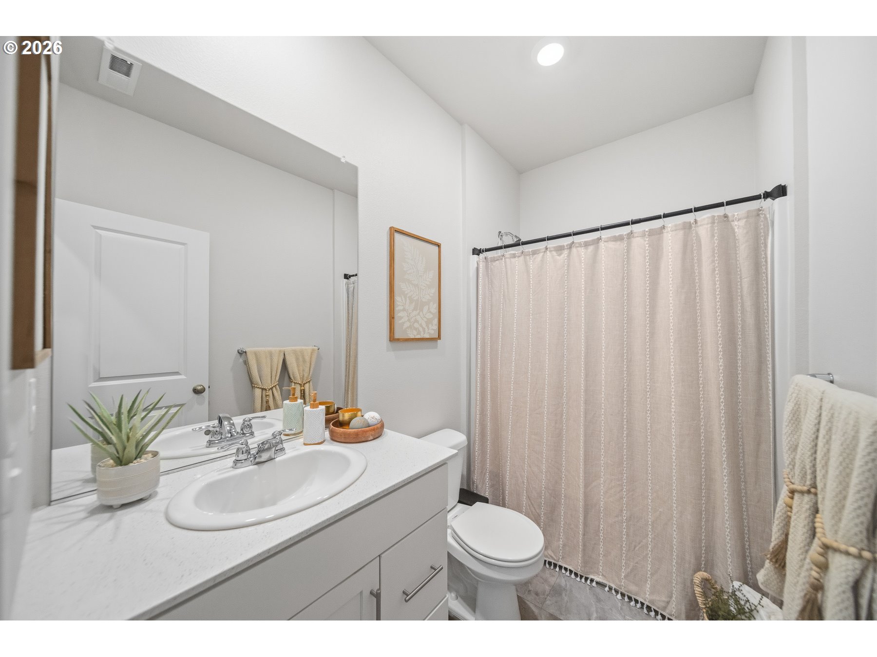 597 Northeast Union Loop Prineville, OR 97754 - Photo 19 of 22 a bathroom with a sink toilet and a mirror