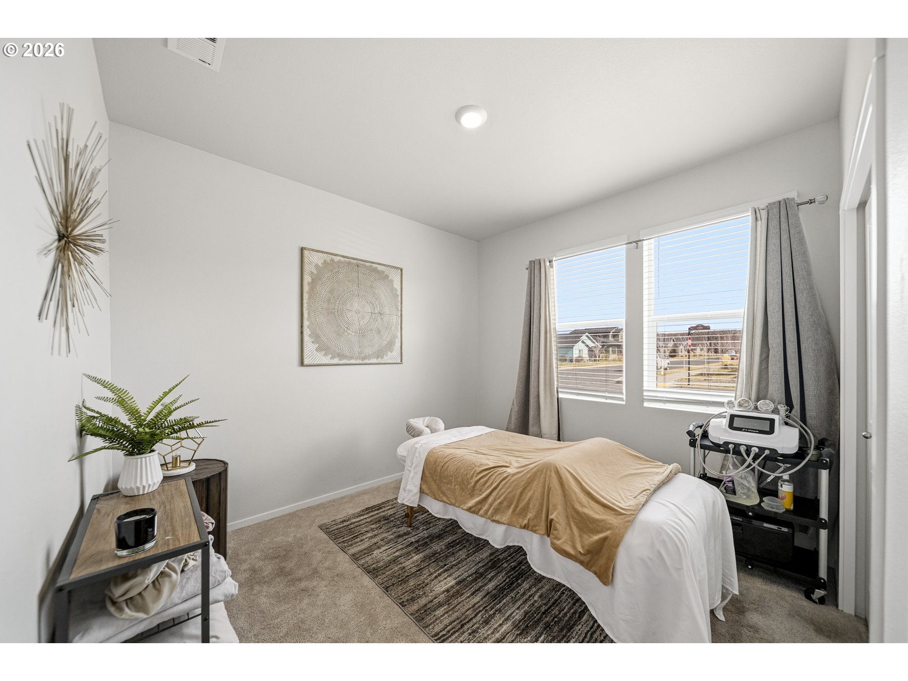 597 Northeast Union Loop Prineville, OR 97754 - Photo 20 of 22 a bedroom with a bed and a window
