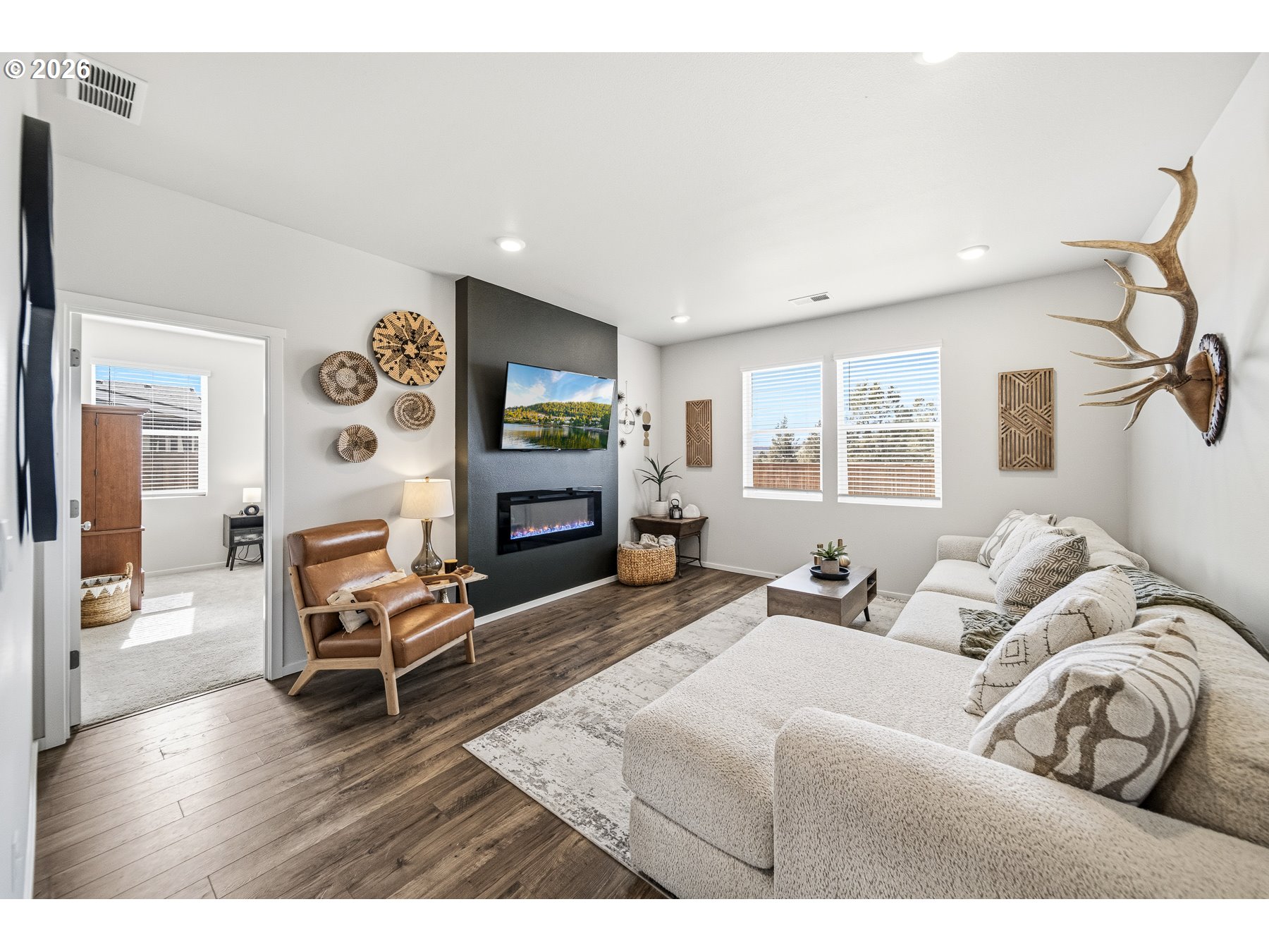 597 Northeast Union Loop Prineville, OR 97754 - Photo 10 of 22 a living room with furniture and a fireplace