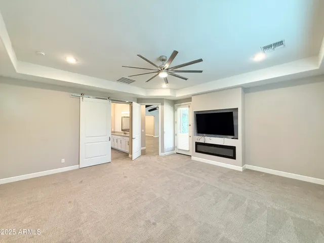 a view of a livingroom with a flat screen tv