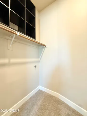 a view of an empty walk in closet