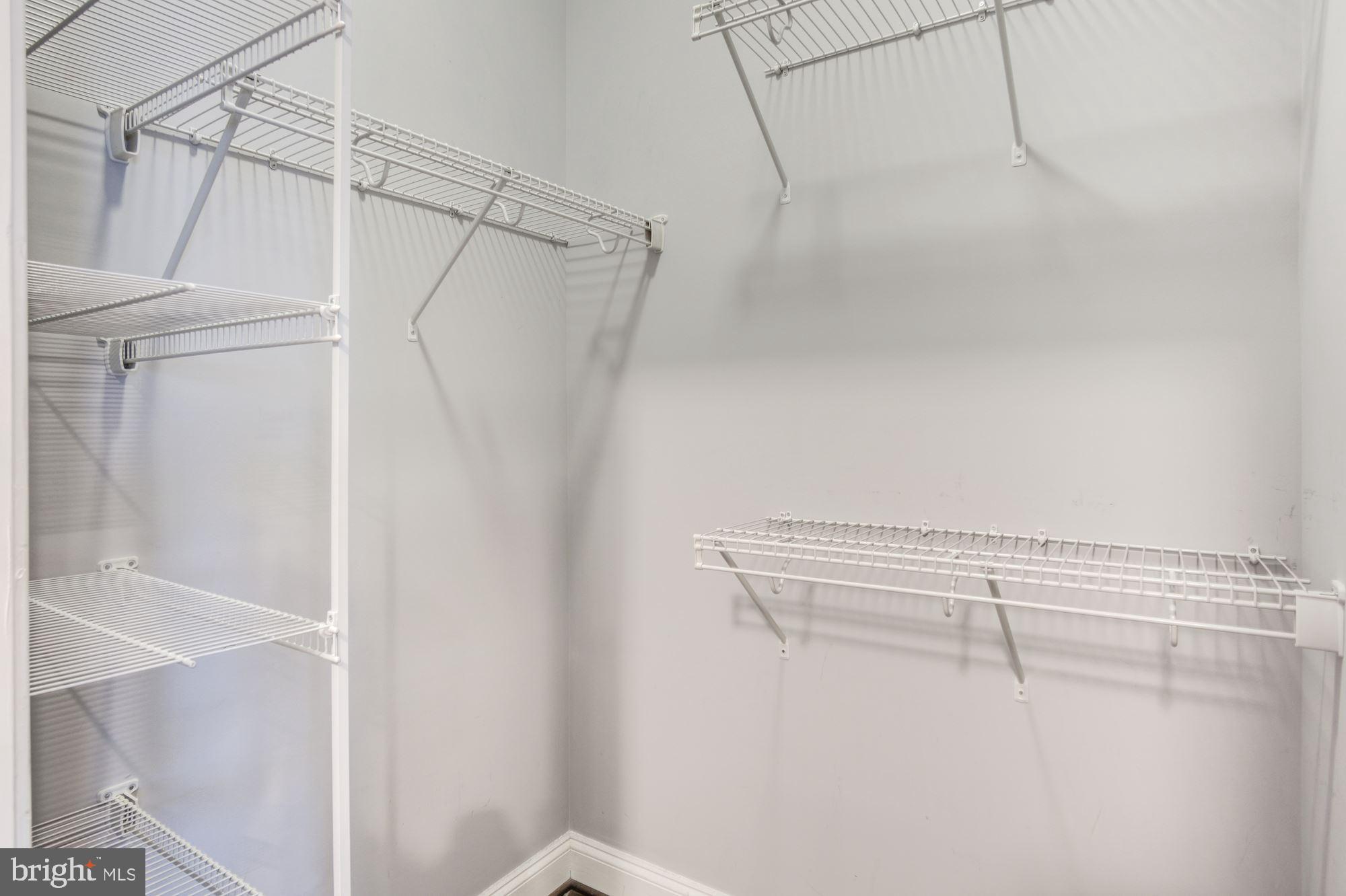 1333 Euclid Street Northwest, Unit 202 Washington, DC 20009 - Photo 10 of 14 a view of a room with racks on the wall