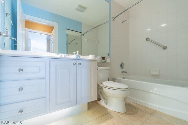 7640 Rozzini Lane Naples, FL 34114 - Photo 9 of 12 a bathroom with a sink a toilet and shower