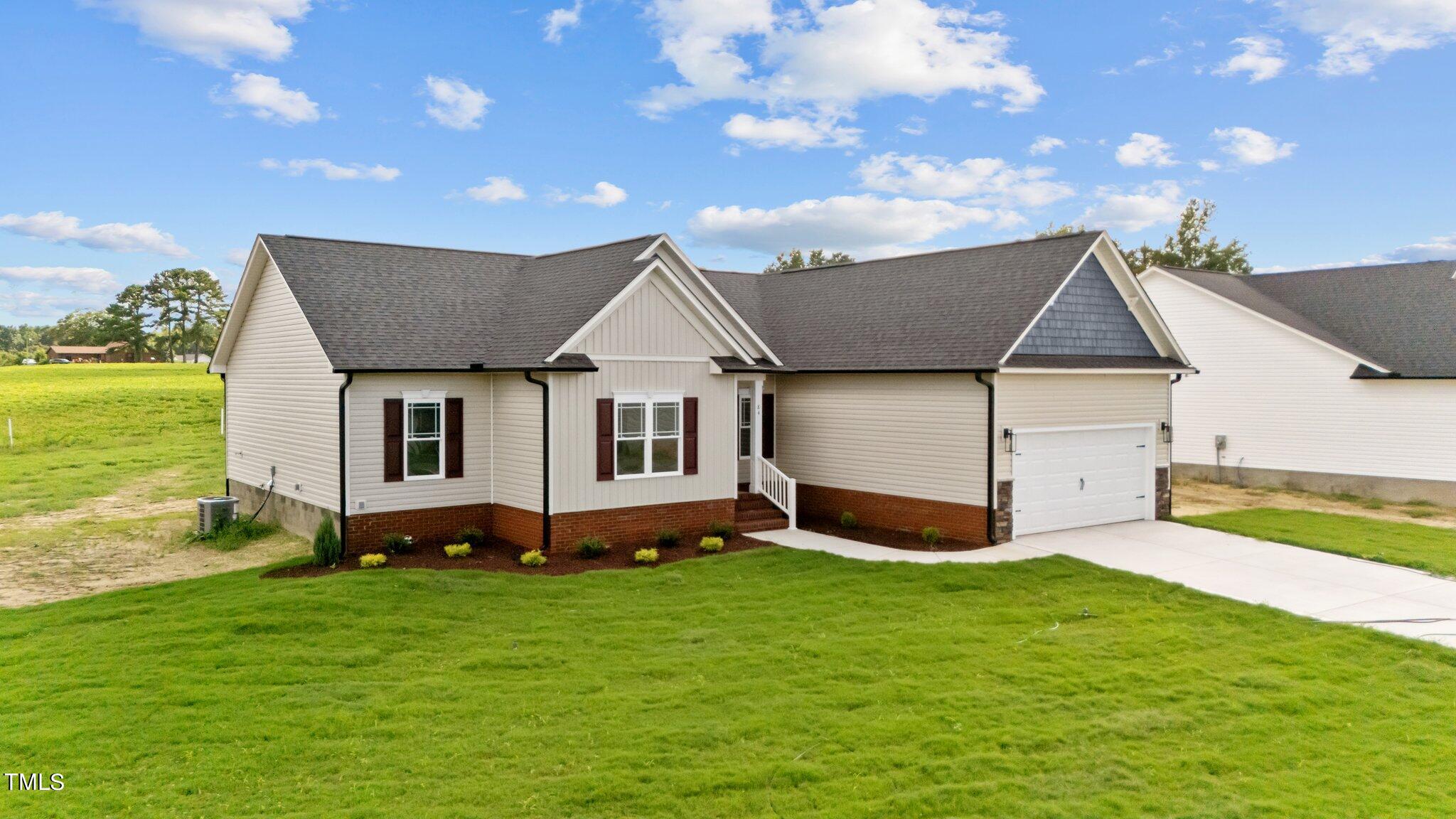 84 Junius Court Angier, NC 27501 - Photo 2 of 34 34-web-or-mls-DJI_20240809162037_0093_D