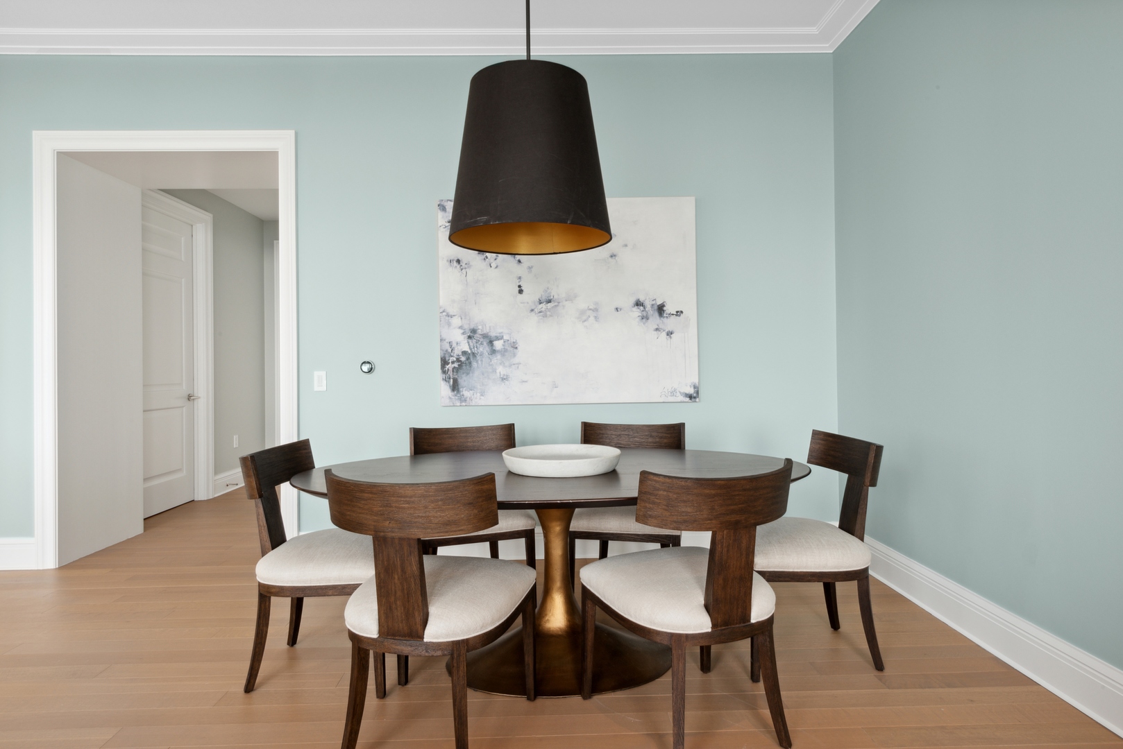 451 East Grand Avenue, Unit 5909 Chicago, IL 60611 - Photo 11 of 38 a view of a dining room with furniture and wooden floor