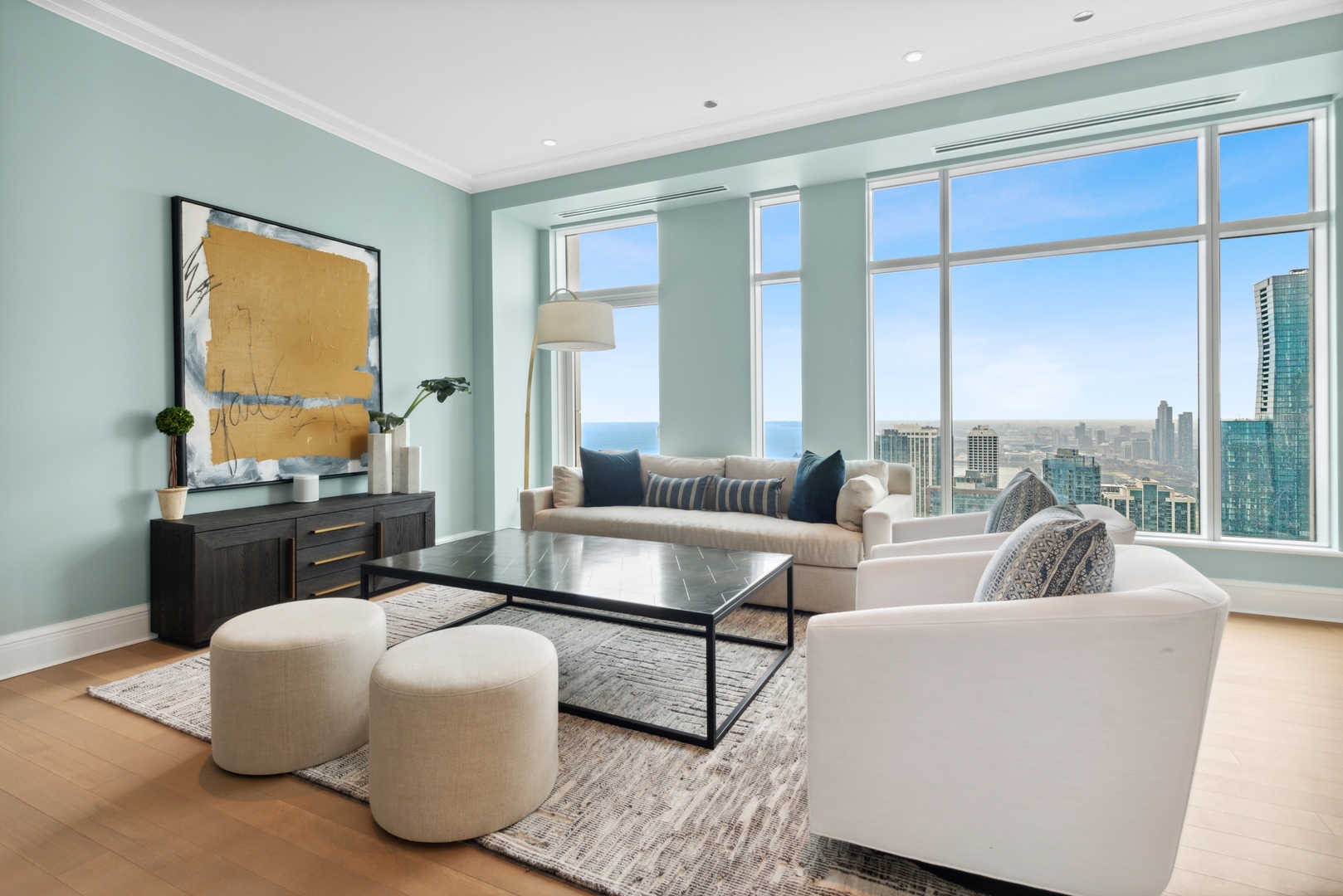 451 East Grand Avenue, Unit 5909 Chicago, IL 60611 - Photo 12 of 38 a living room with furniture and a large window