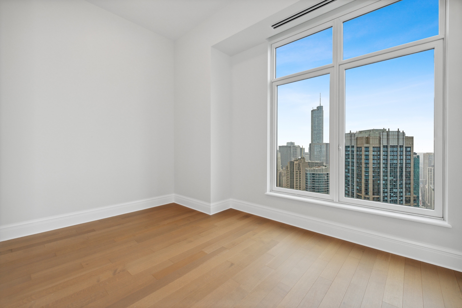 451 East Grand Avenue, Unit 5909 Chicago, IL 60611 - Photo 23 of 38 a view of an empty room with a window