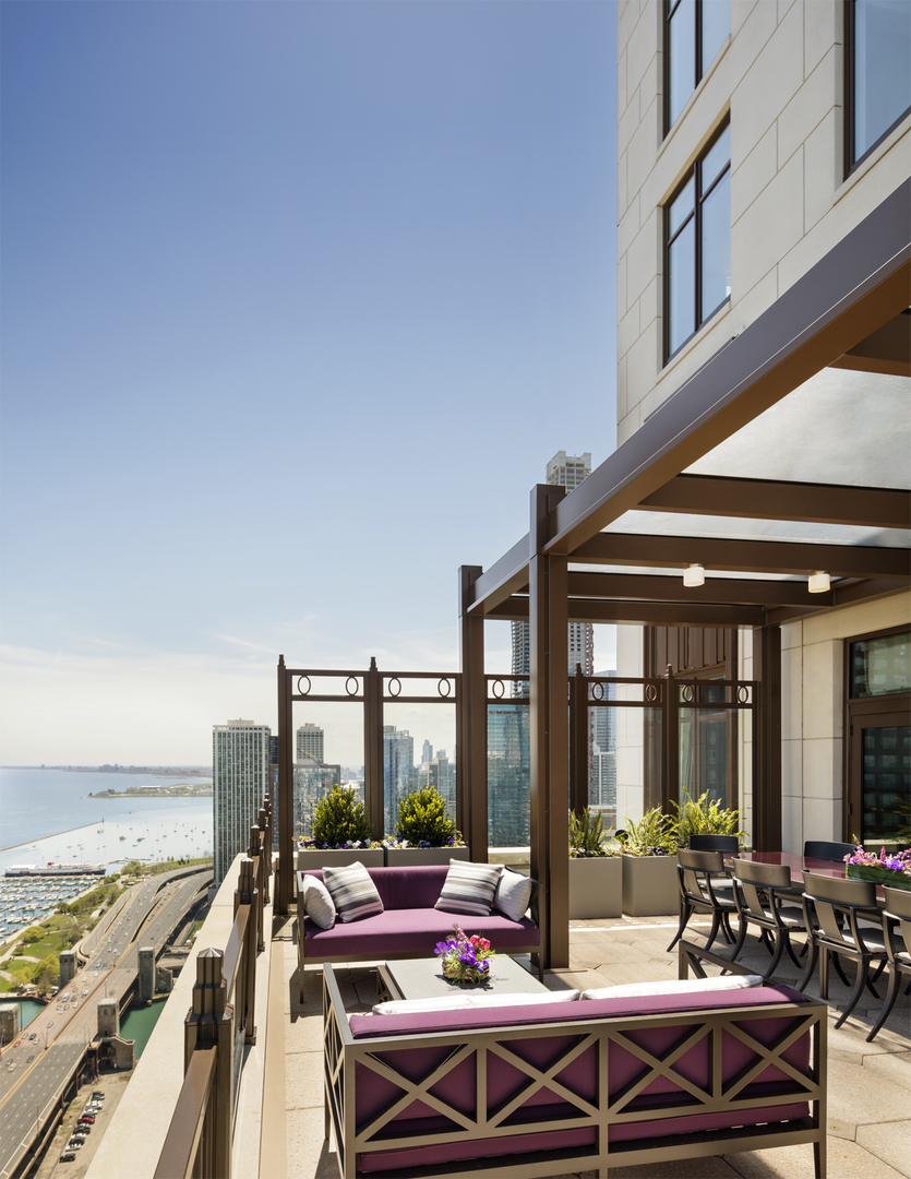 451 East Grand Avenue, Unit 5909 Chicago, IL 60611 - Photo 25 of 38 a outdoor space with lots of tables and chairs