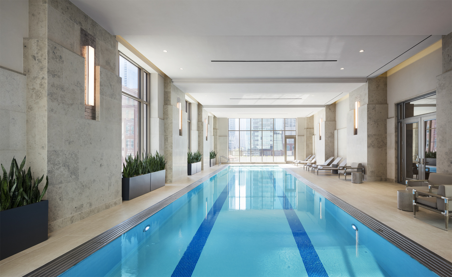 451 East Grand Avenue, Unit 5909 Chicago, IL 60611 - Photo 29 of 38 a large kitchen with kitchen island a large window in it