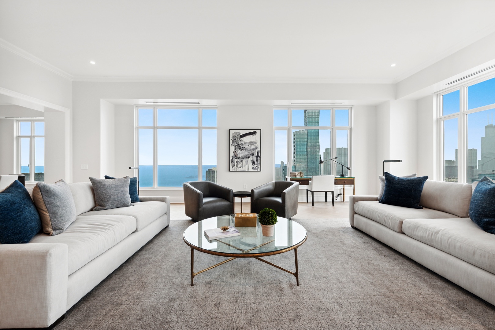 451 East Grand Avenue, Unit 5909 Chicago, IL 60611 - Photo 5 of 38 a living room with furniture potted plant and a window