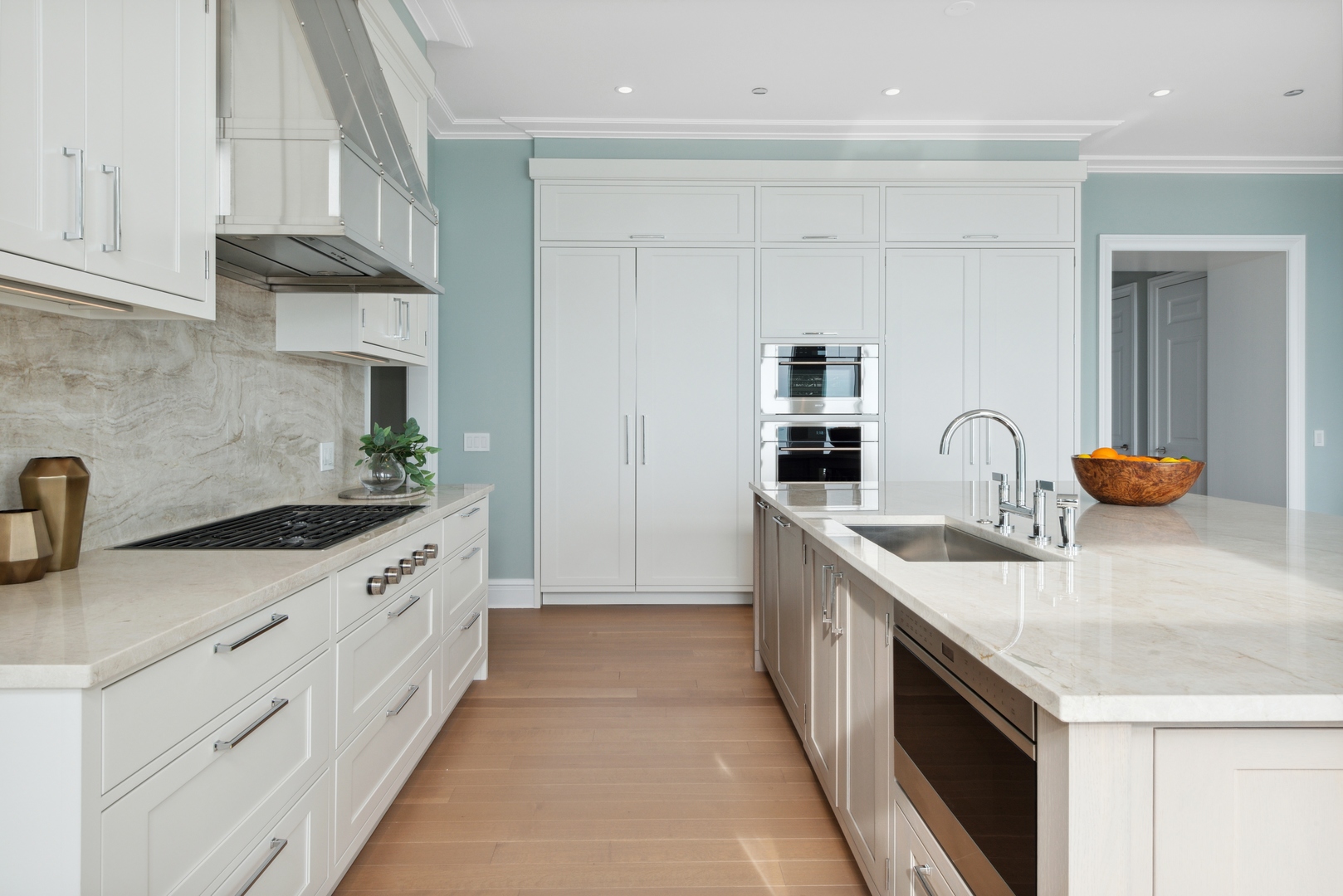 451 East Grand Avenue, Unit 5909 Chicago, IL 60611 - Photo 10 of 38 a kitchen with granite countertop a sink and cabinets