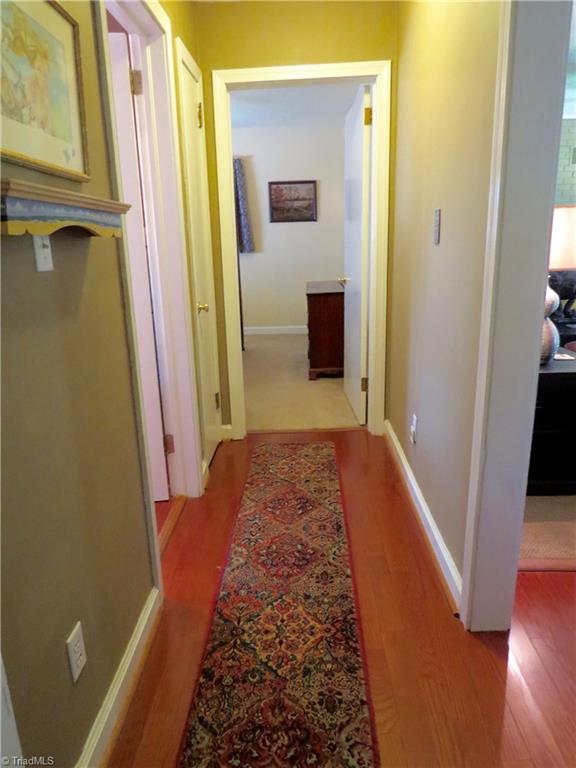 2881 Swallow Road Reidsville, NC 27320 - Photo 13 of 16 Hallway with genuine hardwood floors