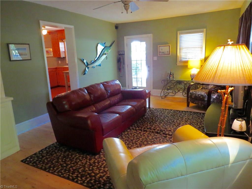 2881 Swallow Road Reidsville, NC 27320 - Photo 6 of 16 Large Den / Recreation room with entry door to carport area