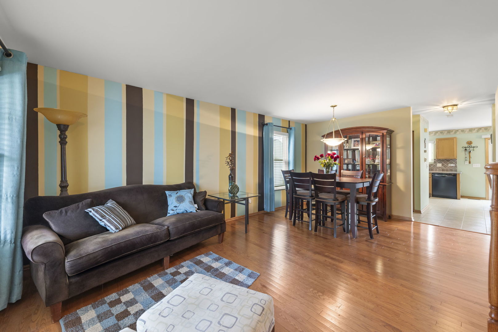 2217 Cedar Ridge Drive Plainfield, IL 60586 - Photo 2 of 26 a living room with furniture and wooden floor