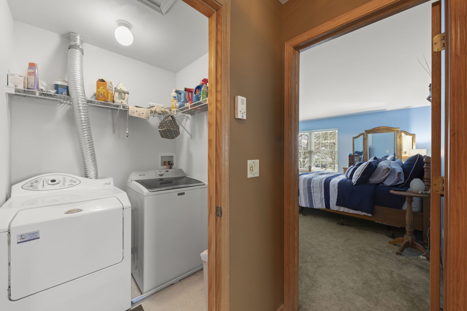 2217 Cedar Ridge Drive Plainfield, IL 60586 - Photo 21 of 26 a view of utility room and bedroom