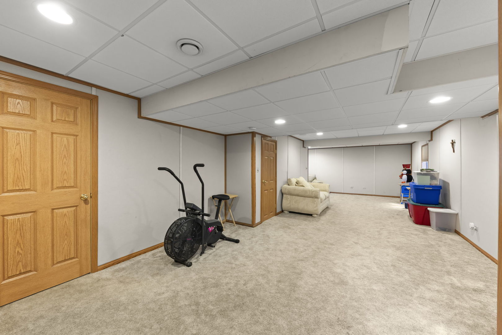 2217 Cedar Ridge Drive Plainfield, IL 60586 - Photo 23 of 26 a view of a room with gym equipment