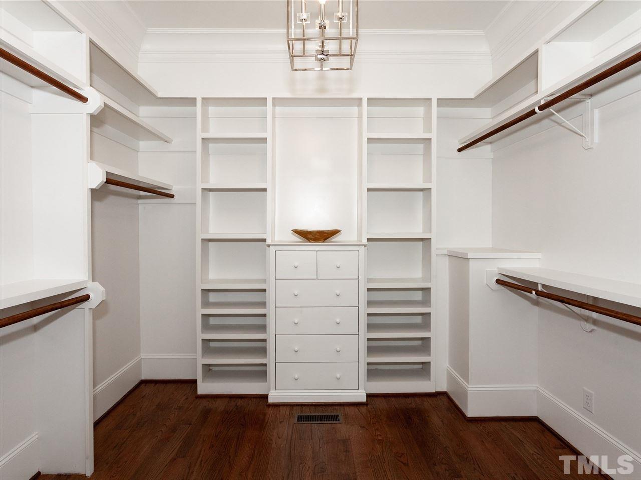 2804 Oberry Street Raleigh, NC 27607 - Photo 18 of 25 a view of walk in closet with empty racks