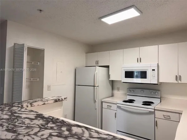 a sink with cabinets