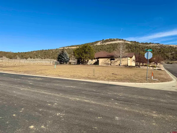 a view of houses with a ocean view