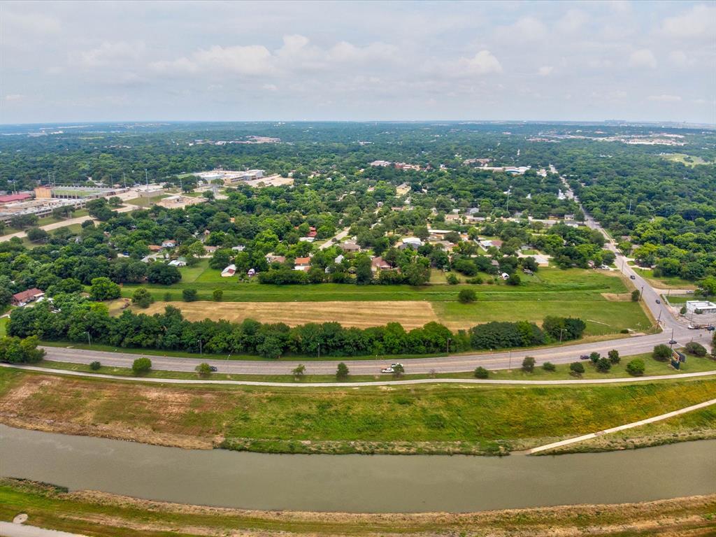 4570 White Settlement Road Fort Worth, TX 76114 - Photo 2 of 8 an aerial view of residential houses with outdoor space and lake view