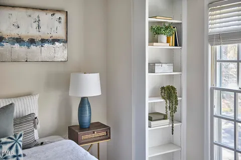 a bathroom with a bathtub and a mirror
