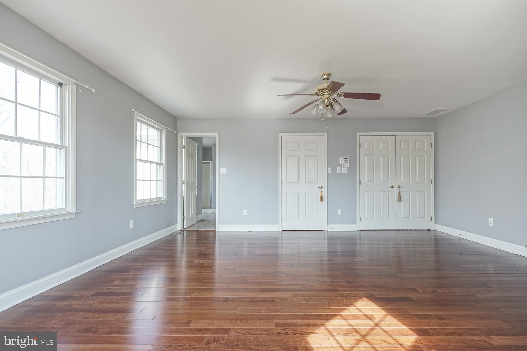 413 Chairville Road Southampton, NJ 08088 - Photo 22 of 39 wooden floor in an empty room with a window