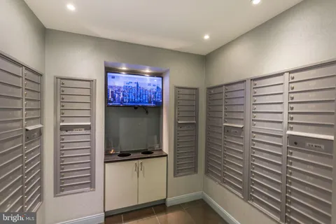 a bathroom with a shower and a sink