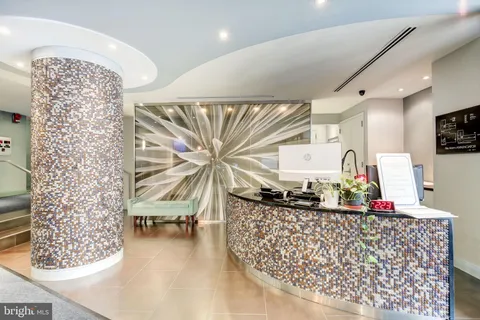 a living room with a couch and a table