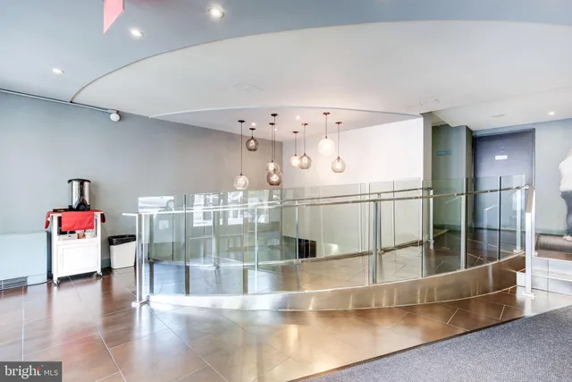 a view of a hallway with an entryway