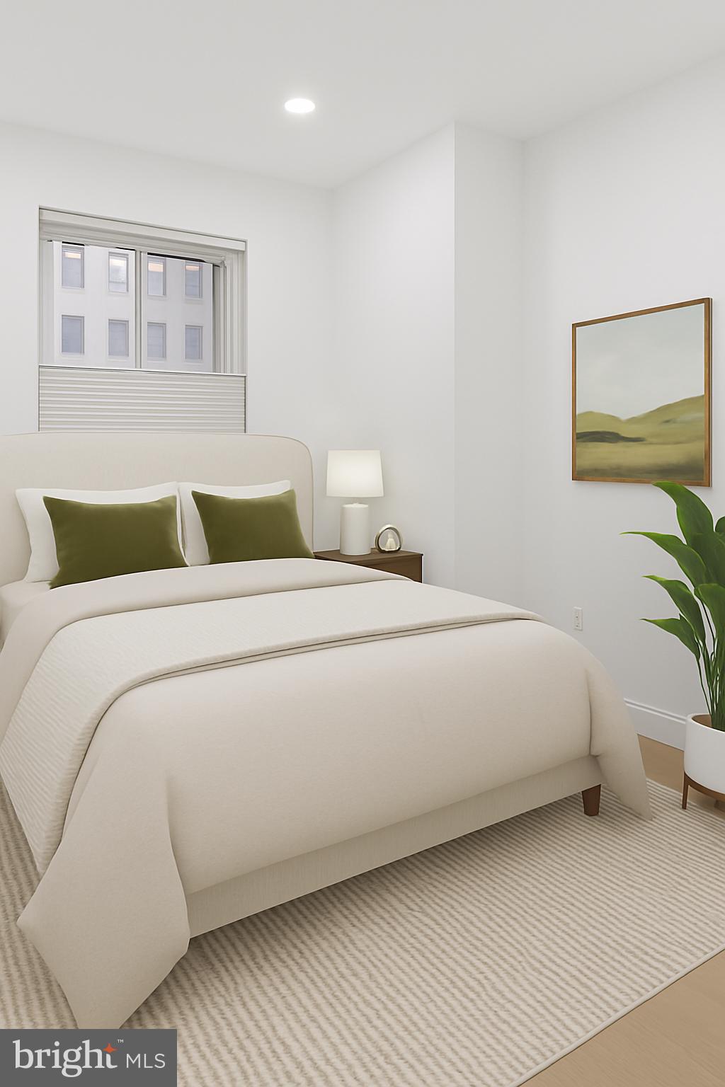 1718 P Street Northwest, Unit L18 Washington, DC 20036 - Photo 10 of 18 a bedroom with a bed and a painting on the wall