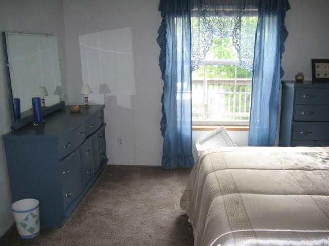 261 Munsons Road Penhook, VA 24137 - Photo 18 of 29 a bedroom with a bed and a window