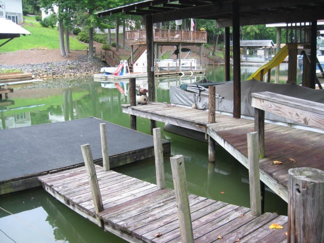 261 Munsons Road Penhook, VA 24137 - Photo 24 of 29 a view of a lake from a balcony