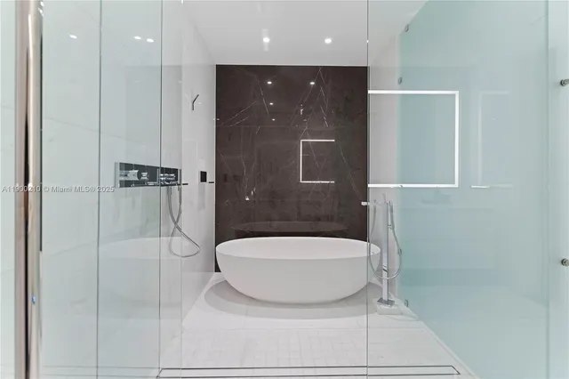 a bathroom with a shower and a toilet