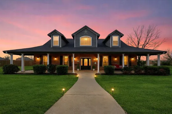a view of a house with swimming pool