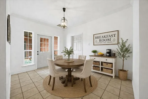 a kitchen with stainless steel appliances granite countertop a sink a counter space and cabinets