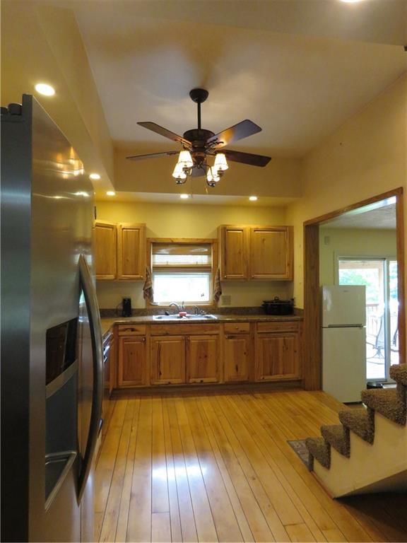 1225 Kentuck Road Ohiopyle, PA 15470 - Photo 8 of 24 a large kitchen with stainless steel appliances a large counter top
